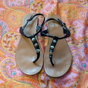 Black and brown spiked sandals